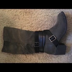 Super cute strappy knee boots.